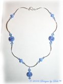 Morning Glory one-of-a-kind handmade artisan lampwork, Swarovski crystal and silver curved tube bead necklace in periwinkle blue with a hook clasp.