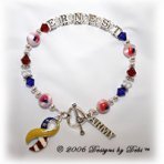 Designs by Debi handmade Support Your Soldier bracelet in sterling silver with the name Ernest in alphabet letter cubes, red, crystal and blue Swarovski crystals, flag beads, star spacers, a heart toggle, Army charm and yellow and flag ribbon charm. Also known as soldier bracelets, deployment bracelets, troop bracelets.