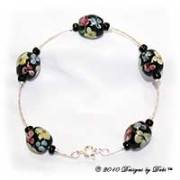 Handmade Jewelry Silver Bangle Bracelet with Black Multi Aloha Florals Beads and a Spring Ring Clasp