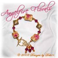 Designs by Debi Handmade Jewelry "Angelfire Florals" Cream, Goldstone and Fuchsia Artisan Handmade Lampwork, Bali Gold Vermeil Floral Pillows and Swarovski Crystal Fuchsia and Topaz Bicones Bracelet with a Gold Vermeil Round Floral Toggle Clasp ~ OOAK