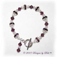 Designs by Debi Handmade Jewelry Swarovski Crystal Amethyst Bicones and Silver Filigree Bracelet with a Silver Round Toggle Clasp