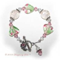 Designs by Debi Handmade Jewelry Pink Crackle, Roses on Hearts and Swarovski Crystal and Light Rose Bicones Bracelet with a Silver Rose and Crystal Toggle Clasp