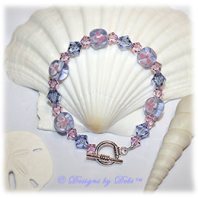 Designs by Debi Handmade Jewelry Tanzanite and Pink Aloha Floral Bracelet with Swarovski Crystal Violet and Rosaline Bicones and a Sterling Silver Plated Round Toggle Clasp