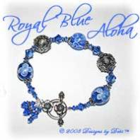 Designs by Debi Handmade Jewelry Royal Blue Aloha Blue Glass Aloha Beads, Bali Silver and Swarovski Crystal Sapphire Bicones Bracelet with a Sterling Silver Round Floral Toggle Clasp 