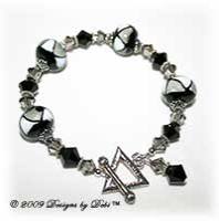 Designs by Debi Handmade Jewelry Black, Gray and White Triangles Glass Beads and Swarovski Crystal Jet and Black Diamond Bicones Bracelet with a Sterling Silver Triangle Toggle Clasp
