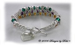 Designs by Debi Handmade Jewelry Personalized Keepsake Bracelet Grandmother's Bracelet, Name Bracelet, Birthstone Bracelet, Brag bracelet three strands with sterling silver, Swarovski Crystals, Grandma charm and heart toggle, topaz and amethyst purple and emerald green and sterling silver