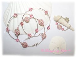 Designs by Debi Handmade Jewelry Aloha Collection  Bangle Trio and Anklet Set. Features a trio of silver bangles with pink aloha floral beads and swarovski crystal light rose bicones and a matching anklet.
