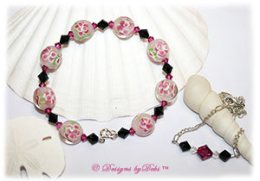 Designs by Debi Handmade Jewelry Aloha Collection Fuchsia and Black Bangle Bracelet and Anklet Set. Features beautiful raspberry aloha floral glass beads, swarovski crystal jet black and fuchsia bicones, a silver spring ring clasp and matching anklet.
