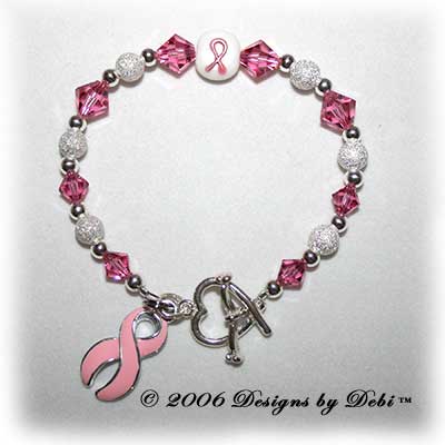 Designs by Debi Handmade Jewelry sterling silver and pink Swarovski crystal awareness bracelet with pink ribbon charm for breast cancer, cleft palate, cleft lip