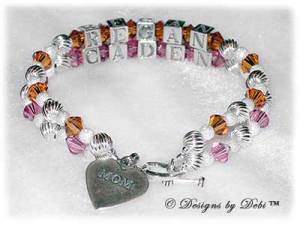 Designs by Debi Handmade Jewelry Melania Style Bracelet in the Twist and Stardust bead combination with Topaz (November) and Rose (October) crystals, a Heart toggle clasp and Mom heart charm. 