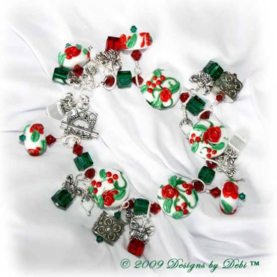 The Perfect Christmas Present Handmade Bracelet made with artisan handmade lampwork beads, Bali silver, Swarovski crystal, and cat's eye with a Bali toggle style clasp.