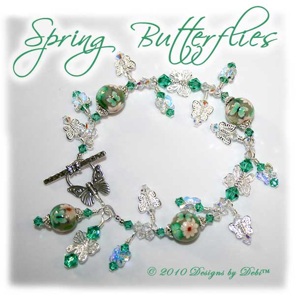 Spring Butterflies One-of-a-Kind Handmade Bracelet and Earrings Set. Bracelet made with artisan handmade polymer clay round beads with green and white flowers and green butterflies, sterling silver butterflies, Swarovski crystal butterflies and Swarovski crystal AB and light emerald bicones with a sterling silver butterfly toggle style clasp.
