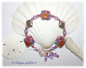 Designs by Debi Handmade Jewelry Aloha Collection Hawaiian Lei Bracelet featuring purple, pink and orange square aloha floral handmade lampwork beads, bali bright silver swirled bead caps and embossed floral diamond-shaped pillows, swarovski crystal violet, rose and padparadscha bicones, multiple dangles and a petite sterling silver flower toggle clasp.