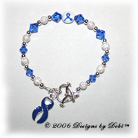 Designs by Debi Handmade Jewelry sterling silver and blue Swarovski crystal awareness bracelet with blue ribbon charm for domestic violence, guillain-barre, histiocytosis, huntington's, syringomyelia, prostate cancer