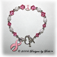 sterling silver and pink Swarovski crystal awareness bracelet with pink ribbon charm