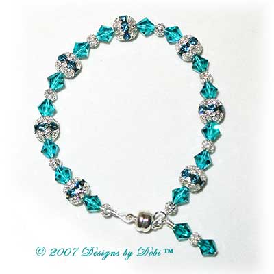 Designs by Debi Handmade Jewelry Swarovski Crystal Blue Zircon Bicones and Silver Filigree Bracelet with a Magnetic Clasp