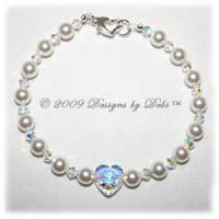 White pearl, Swarovski crystal AB heart and bicones handmade bracelet with a sterling silver heart lobster clasp for wedding bride.