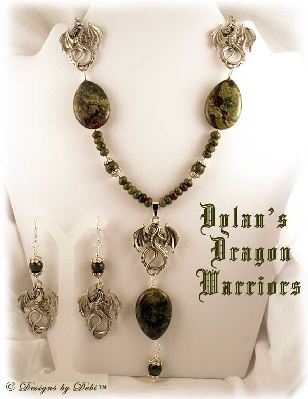 Designs by Debi Handmade OOAK Jewelry for Charity Necklace and Earrings Set for August 2011 called Dylan's Dragon Warriors. Made with multiple pewter dragons, green and red dragon blood jasper in teardrop, round and rondelle shapes and pewter dragon feet bead caps.