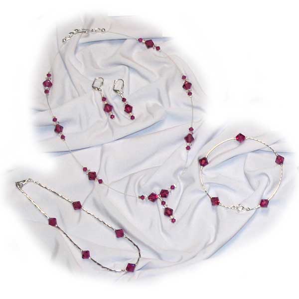 Designs by Debi Signature Collection handmade jewelry set necklace, earrings, bracelet and anklet in silver with fuchsia Swarovski crystal bicones.
