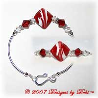 Designs by Debi Handmade Jewelry Red and White Raked Diamond Artisan Handmade Lampwork Focal Bead and Swarovski Crystal Siam and Crstal Bicones Silver Fitted Bangle Bracelet with Hook Clasp