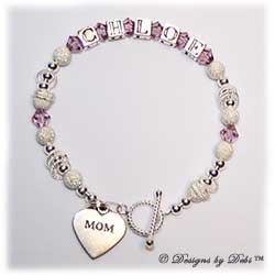 Designs by Debi Handmade Jewelry Keepsake Bracelet in the Isabella Style Stardust and Seamless Round bead combination with Light Amethyst (June) crystals, a Bright Twisted Rope toggle clasp and Mom heart charm.  Mother's Bracelet