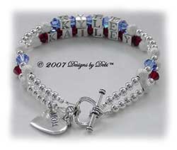 Designs by Debi Handmade Jewelry Personalized Keepsake Bracelet 2 strand Keepsake Bracelet in the Karen Style Stardust and Seamless Round bead combination with Sapphire (September) and Siam (July) crystals, a heart toggle clasp and Mom heart charm. Mother's Bracelet