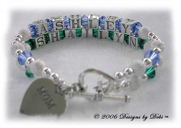 Designs by Debi Handmade Jewelry 2 strand Karen Style Bracelet in the Stardust and Seamless Round bead combination with Sapphire (September) and Emerald (May) crystals, a heart toggle clasp and Mom heart charm.