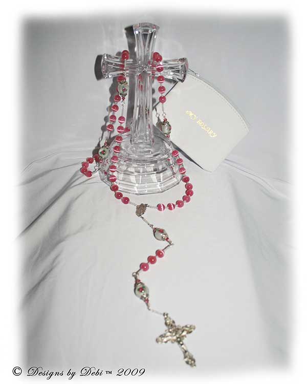 Handmade pink cat's eye, white with pink roses beads and sterling silver rosary.