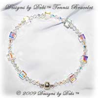 Designs by Debi Tennis Bracelet of Swarovski Crystal AB aurora borealis cube and bicone crystals with a magnet clasp.