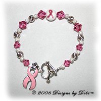 sterling silver and pink Swarovski crystal awareness bracelet with pink ribbon charm