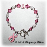 sterling silver and pink Swarovski crystal awareness bracelet with pink ribbon charm
