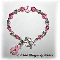 sterling silver and pink Swarovski crystal awareness bracelet with pink ribbon charm