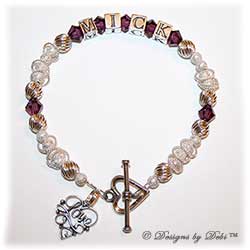 Designs by Debi Handmade Jewelry Keepsake Bracelet in the Isabella Style Twist and Stardust bead combination with Amethyst (February) crystals, a Heart toggle clasp and Love Filigree charm.  Wife's Bracelet Girlfriend's Bracelet