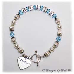 Designs by Debi Handmade Jewelry Keepsake Bracelet in the Jasmine Style Corrugated and Pearls bead combination with Aquamarine (March) crystals, a bright twisted rope toggle clasp and Grandma heart charm. Grandmother's or Nana's Bracelet