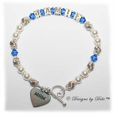 Designa byDebi Handmade jewelry Samantha Style Bracelet in the Twist and Pearls bead combination with Sapphire (September) crystals, a bright twisted rope toggle clasp and Mom heart charm.