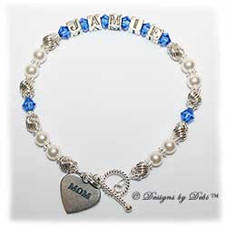 Designs by Debi Handmade Jewelry Keepsake Bracelet in the Samantha Style Twist and Pearls bead combination with Sapphire (September) crystals, a bright twisted rope toggle clasp and Mom heart charm. Mother's Bracelet