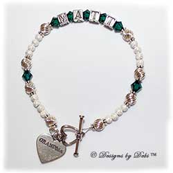 Designs by Debi Handmade Jewelry Keepsake Bracelet in the Zoe Style Twist and Stardust with Antiqued bead combination, Emerald (May) crystals, a heart toggle clasp and Grandma heart charm. Grandmother's or Nana's Bracelet