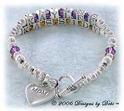 Designs by Debi Handmade Jewelry 2 strand Keepsake Bracelet in the Karen Style Corrugated bead combination with Amethyst (February) and Topaz (November) crystals, a heart toggle clasp and Mom heart charm.  Mother's Bracelet