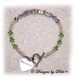 Designs by Debi Handmade Jewelry Keepsake Bracelet in a customized version of the Karen Style Twist and Stardust bead combination with Alexandrite (June alt.) and Peridot (August) crystals, a heart toggle and Daughter heart charm. Daughter's Bracelet