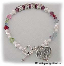 Designs by Debi Handmade Jewelry Karen Style Generations Keepsake Bracelet in the Twist and Stardust bead combination with every family member's birthstone, a heart toggle clasp and Nana heart charm.