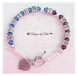 Designs by Debi Handmade Jewelry Couples Keepsake Bracelet in the Karen Style Twist and Stardust bead combination with a heart toggle clasp and Filigree Hearts in Heart charm. Wife's Bracelet Girlfreind's Bracelet